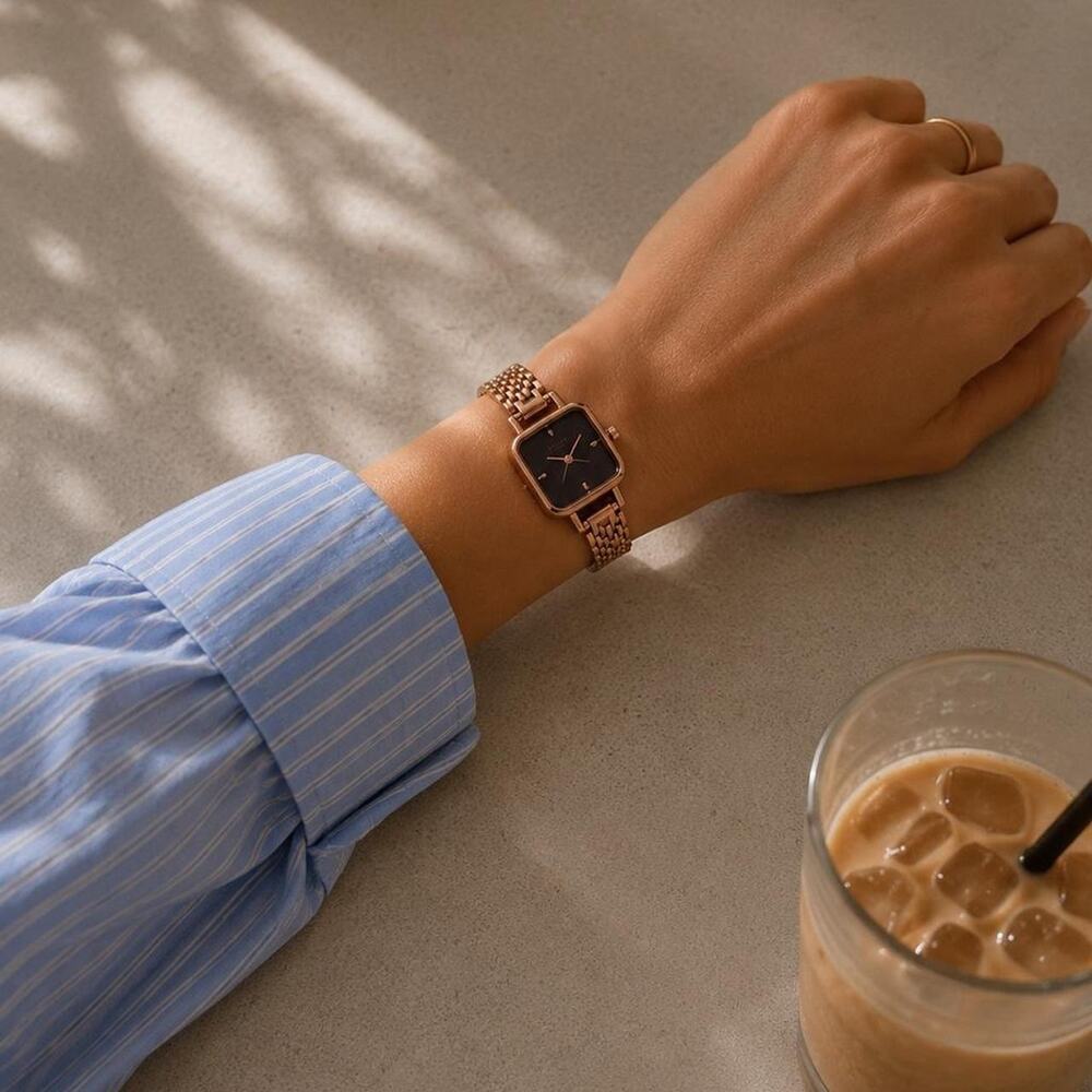 Rose gold watch with black accents - Picture 1 of 7